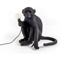 the monkey lamp black sitting