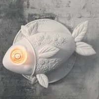 karman applique design aprile en forme de poisson