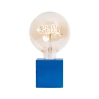 lampe à poser en béton bleu pétrole avec son ampoule à message