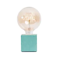 lampe à poser en béton turquoise avec son ampoule à message